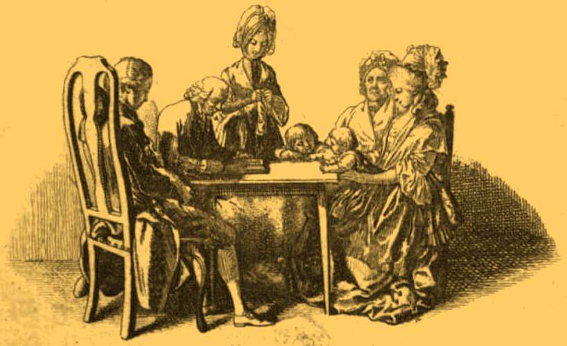 Family_at_table_with_children