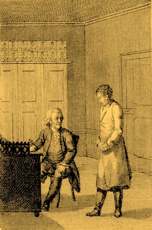 2_men_desk_discussing